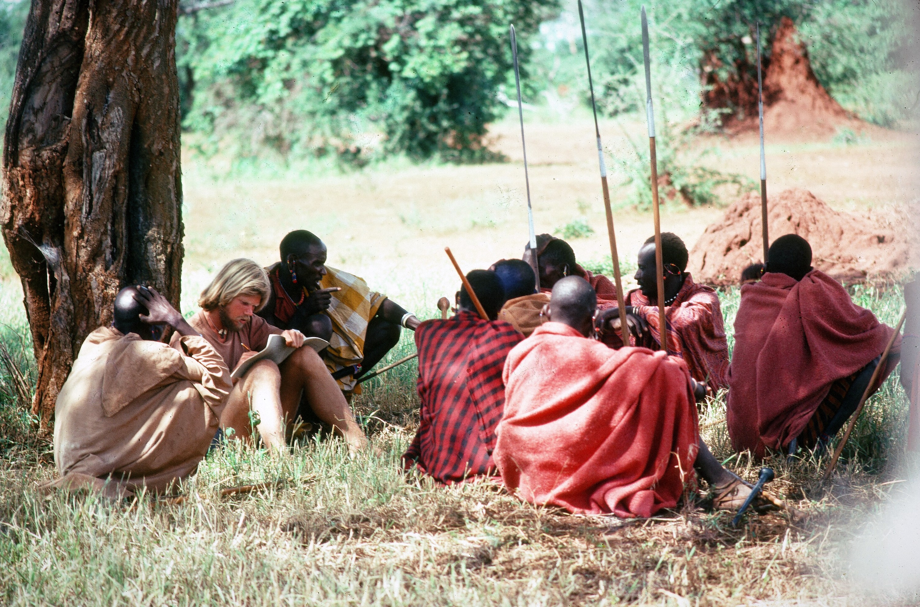 Guests seated in a circle with Maasai elders